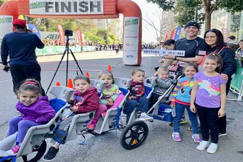 This Dad Ran a 2:19 Half Marathon While Pushing 5 Kids in a Stroller